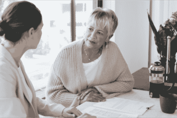 A lawyer consults with a client